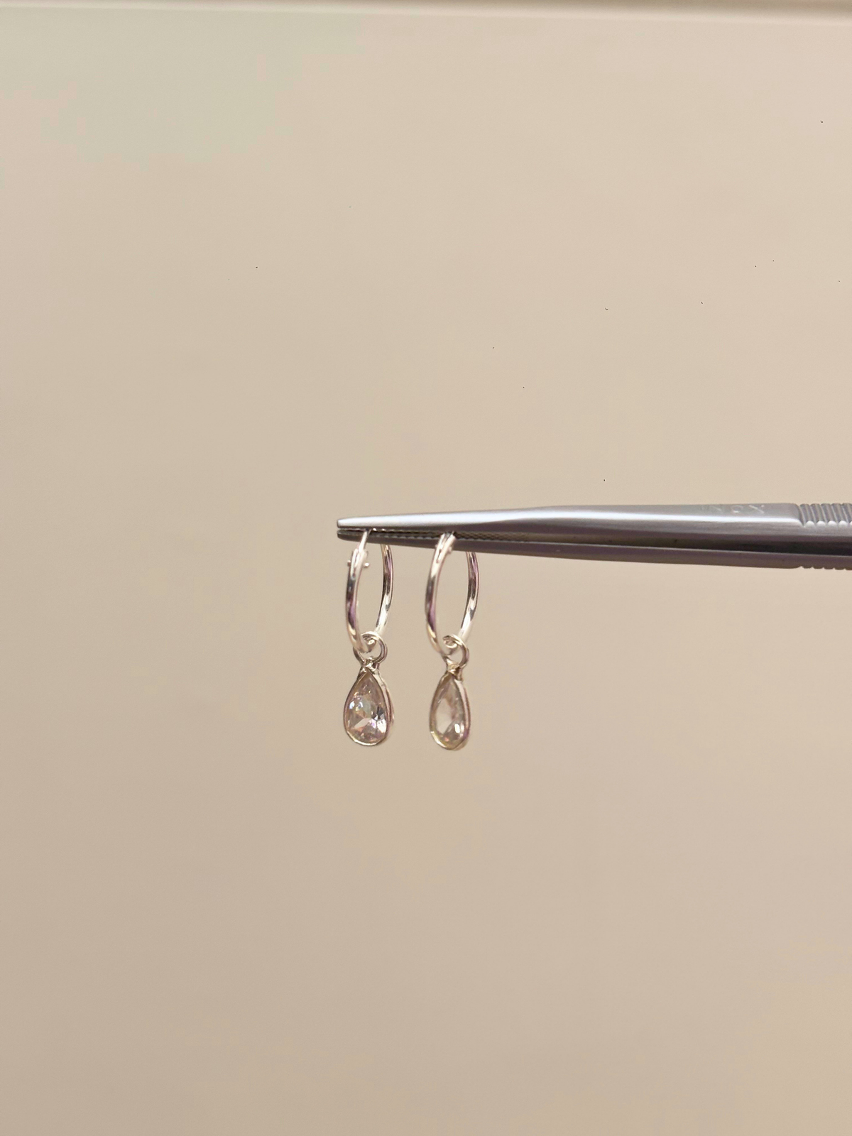 Drop Everything Teardrop Charm Hoops in 925 Silver